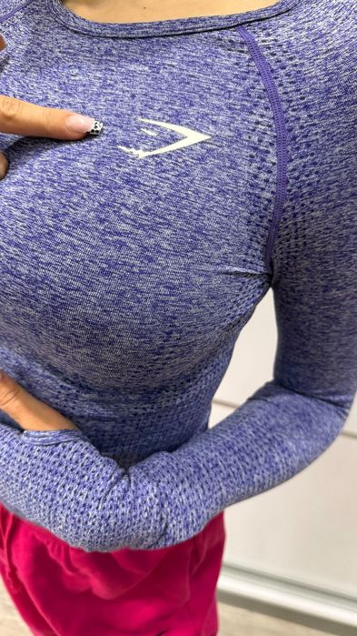 Fioletowy longsleeve modelujący brzuch GymShark XS podkreślający