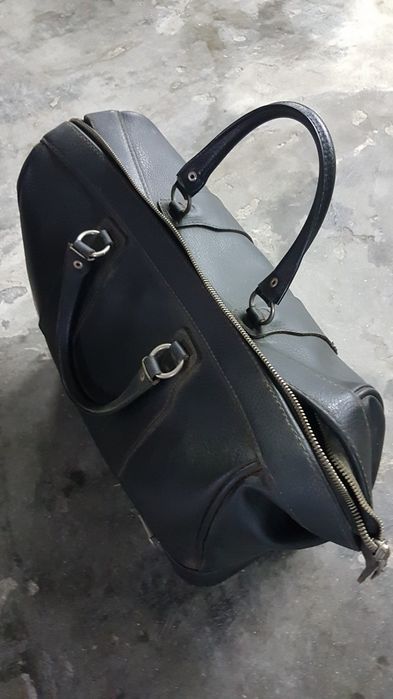 Saco de viagem antigo em puro couro.