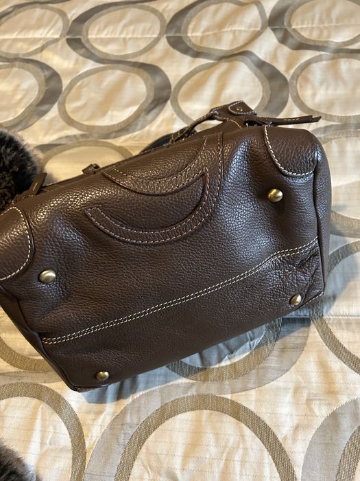 Mala Purificacion Garcia em pele castanha