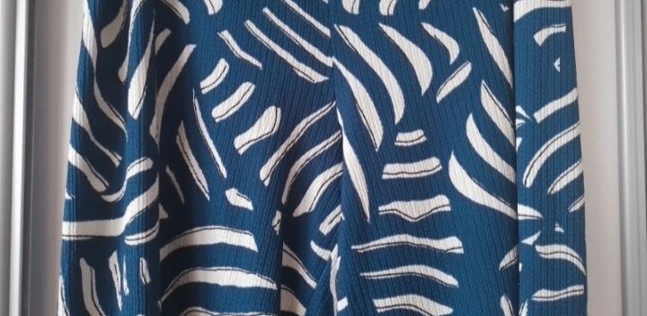 Materiałowe spodnie damskie H&M rozm.50