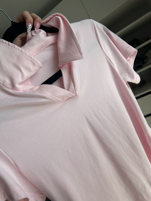 поло рожевого кольору