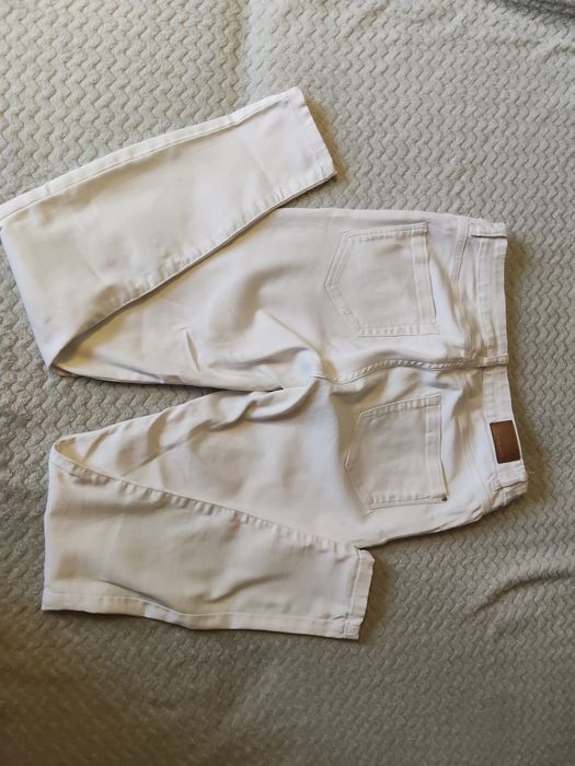 Białe jeansy damskie Orsay rozmiar 38