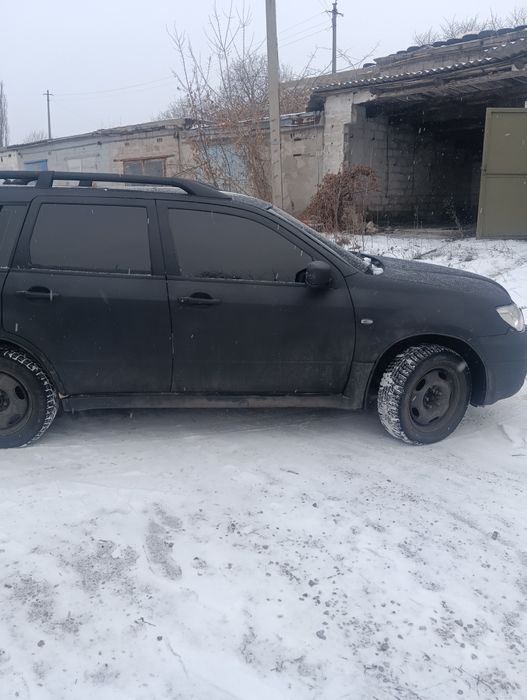 Мицубиси аутлендер