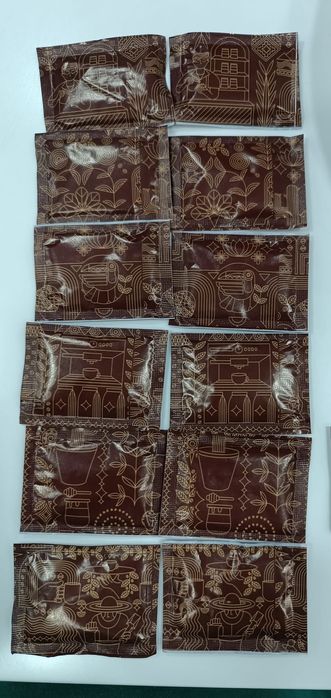 Delta café, pacotes açúcar.