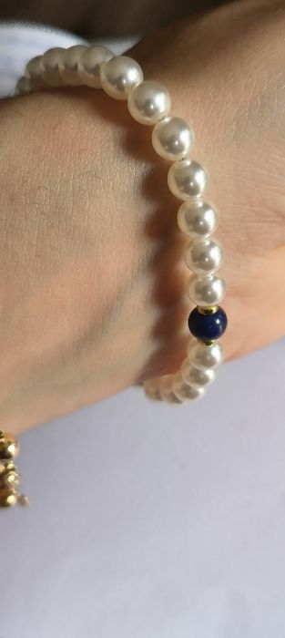Pulseira pérolas com caramujo em prata