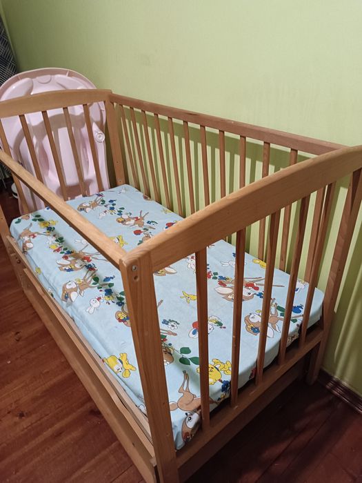 Дитяче ліжечко-трансформер