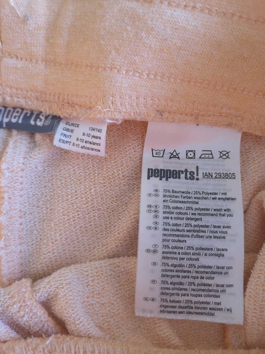 Spodnie dresowe 134 140 morelowe bawełniane ściągacze joggery