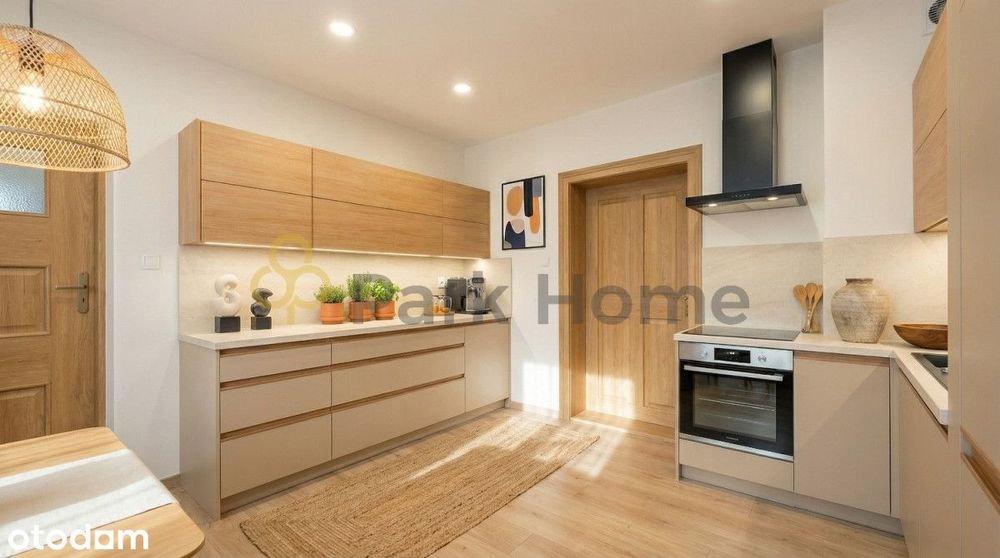 Spokojna okolica - dom z budynkiem gospodarczym.