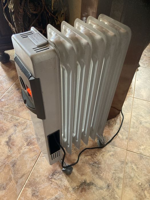 Aquecedor Junex em bom estado de funcionamento