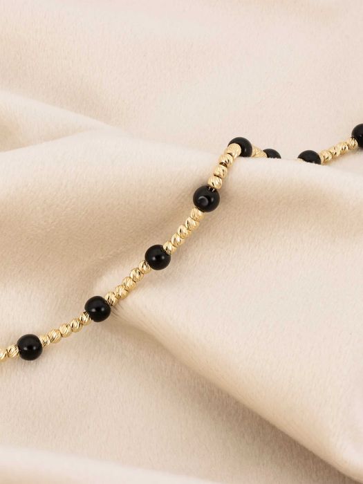 Złota bransoletka 585 diamentowane kulki