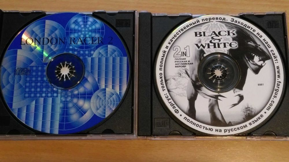 Диски с играми для ПК (цена за 7 штук).