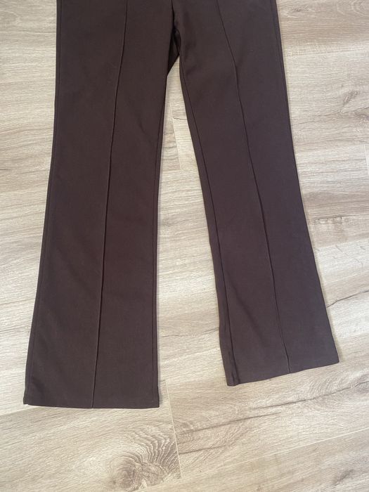 Damskie brązowe eleganckie spodnie XS dzwony