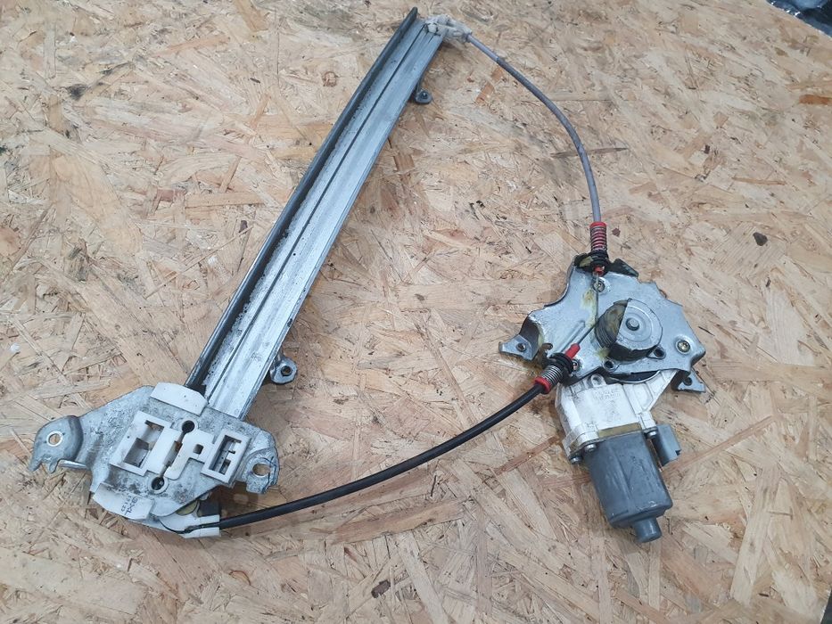 Mechanizm szyby silniczek lewy Nissan Micra k12 04r 3 drzwi