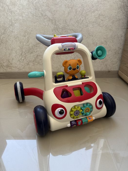 Каталка-ходунки з бізі-бордом для перших кроків малечі