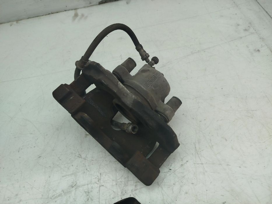 Pinça travão / maxila de travão frente esquerda FORD Focus III