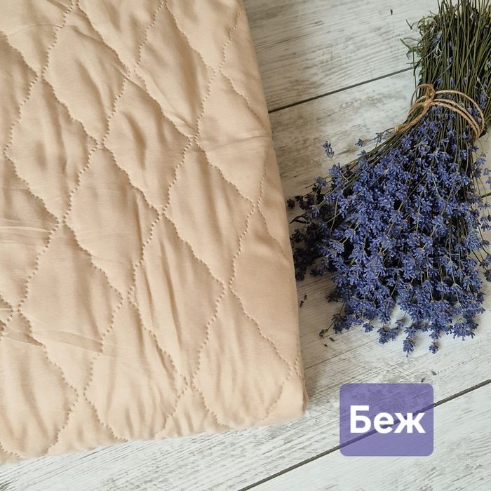 Водонепроникний стьобаний наматрасник-простирадло.