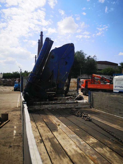 Бортовий напівпричіп Trailer S38.3 EL з маніпулятором PM-350