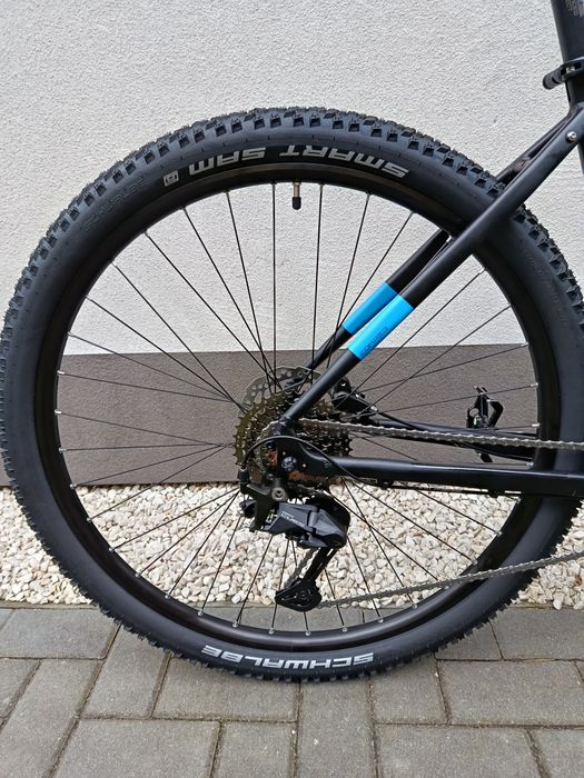 NOWY Kands Comp-er 2026 czarno-niebieski mat koła 29" Shimano Cues 2x9