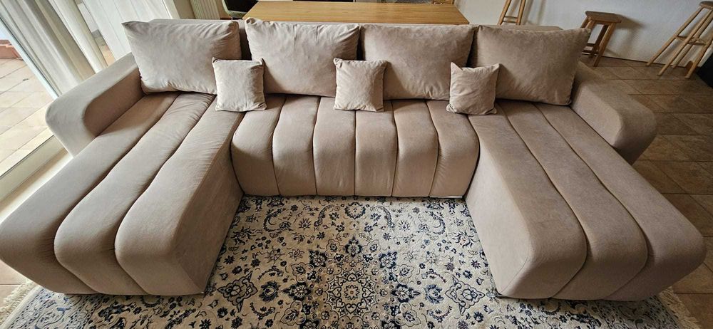 Sofá cama em U em bom estado de conservação