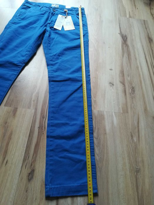 Niebieskie spodnie jeansy slim, rozmiar 28