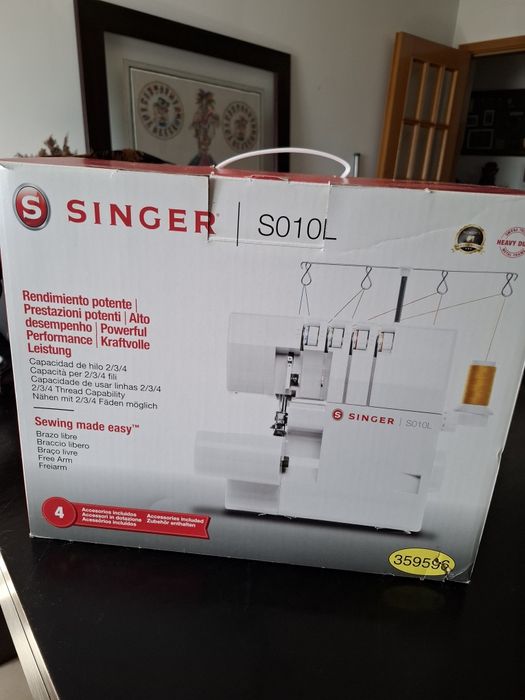 Máquina de costura singer overlock nova