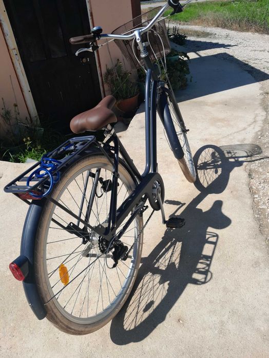 Vendo bicicleta com mudanças automáticas em bom estado quase nova