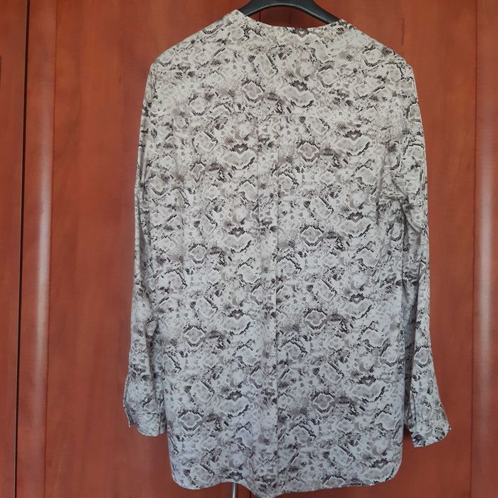 Elegancka bluzka w panterkę Reserved