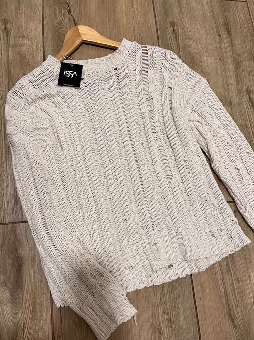 Трендова жіноча рвана кофта