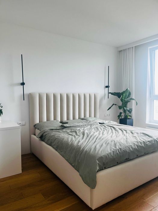 Łóżko tapicerowane półwałki sypialnia panele welur stelaż