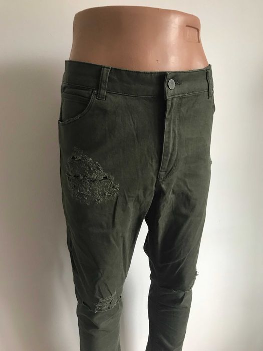 Nowe rurki spodnie dziury material meskie zielone khaki L