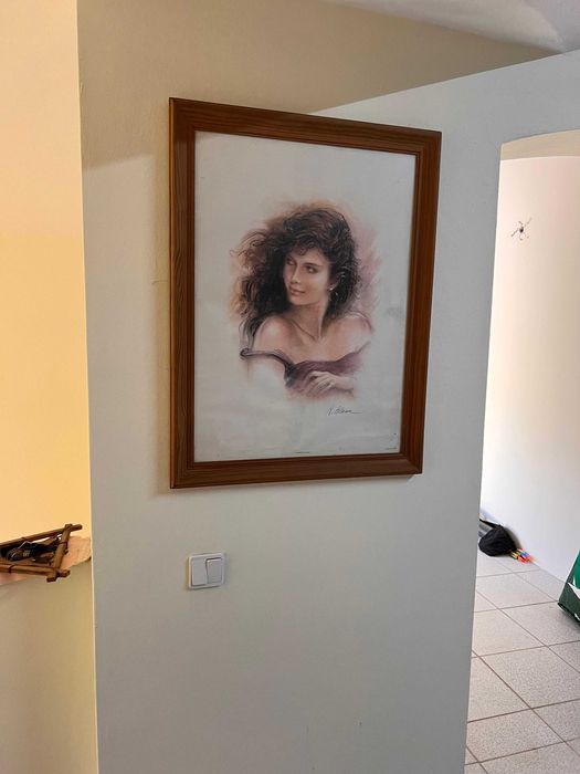 Quadro com moldura em madeira