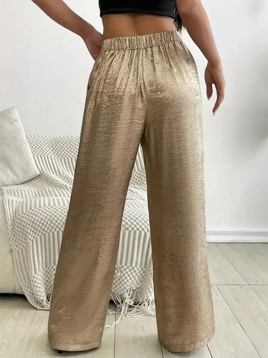 Luźne jasnozłote spodnie w rozmiarze S