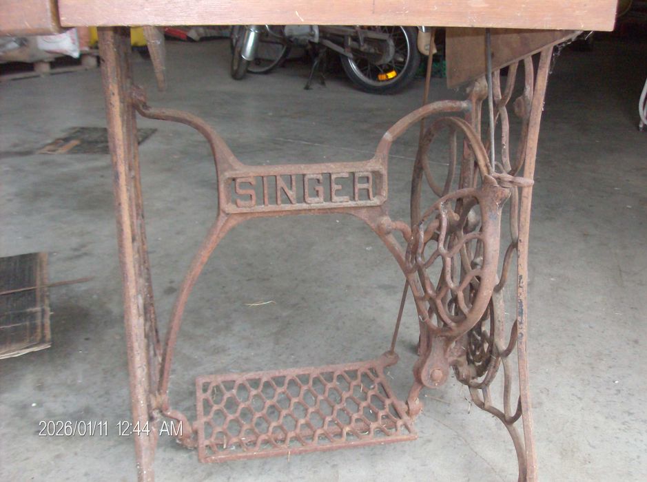 Maquina de Costura marca Singer