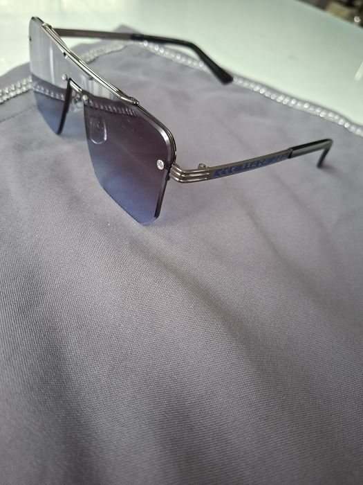 Męskie okulary przeciwsłoneczne Prada. Wyprzedaż