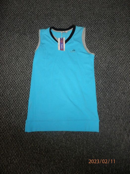 Спортивна Футболка-без рукавка.(Турція) Ціна 100