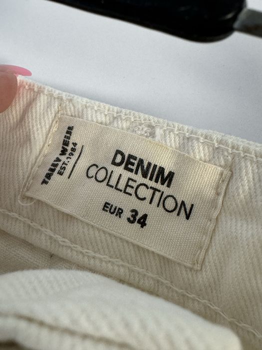 Білі джинсові шорти