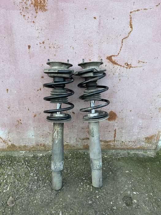 Передні стойки Амортизатори бмв е60