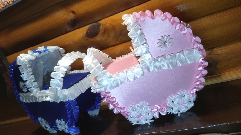 Весільні колиски для збору коштів на хлопчика чи дівчинку