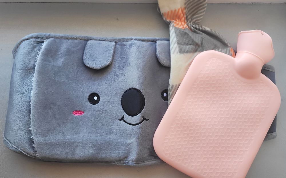 Грілка з мішечком та поясом