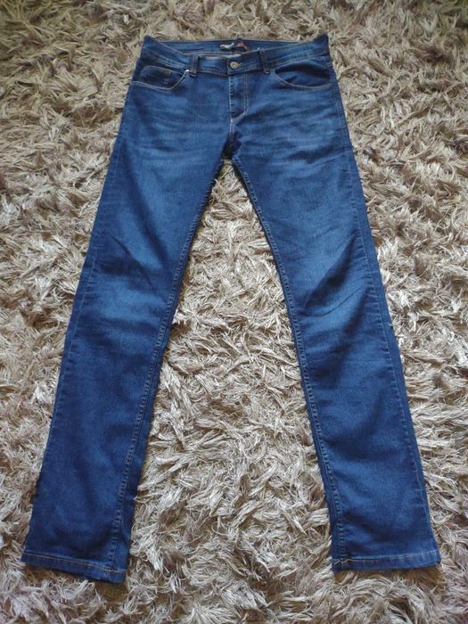 Mega okazja !  Spodnie  jeansy   Boss  Jeans    31