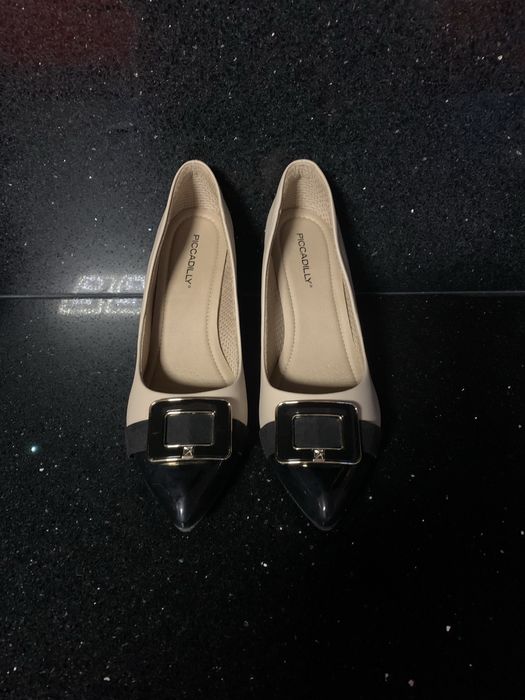 Sapatos bicolos em cx