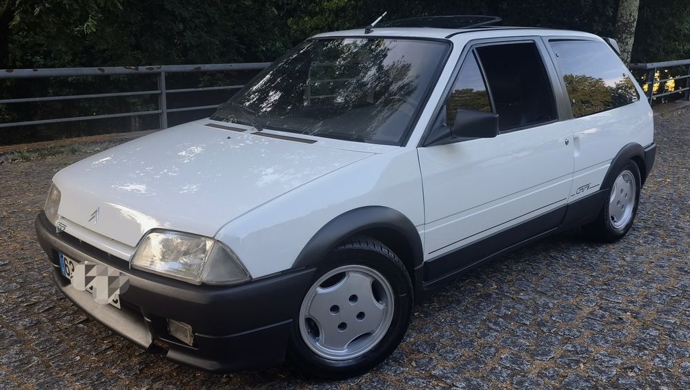 Ax GTi bom estado  teto pele
