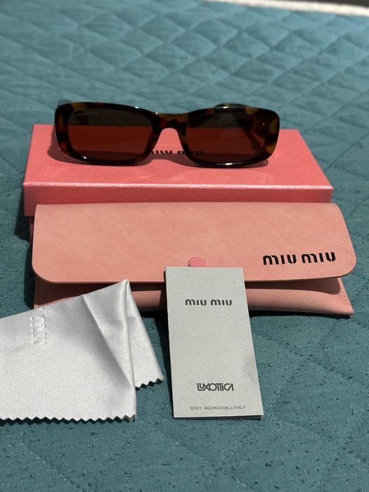 Oculos de sol com caixa