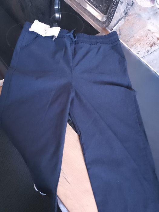 Nowe spodnie 2xl ciemny granat na gumce 3/4 nogawka