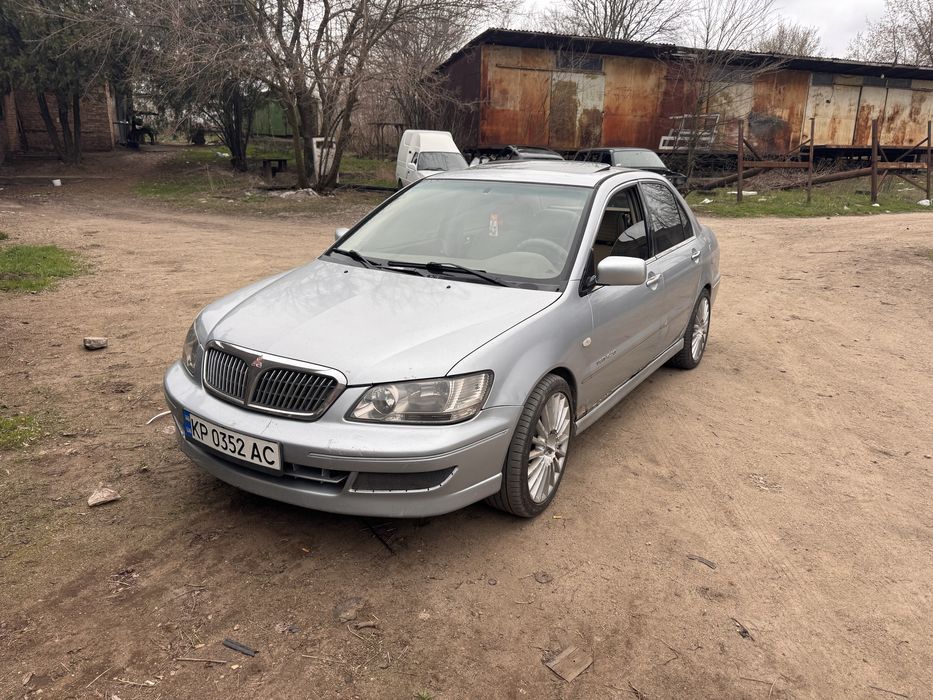 Лансер 9 вираж 1.8