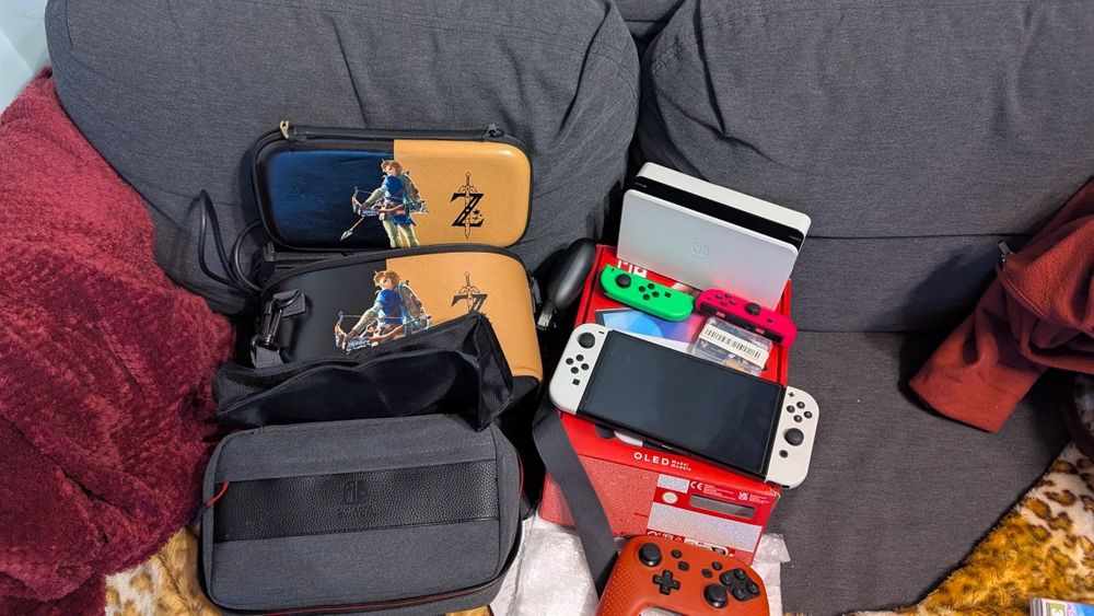 Switch oled com sd 128gb +extras