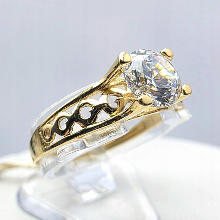 Ażurowy złoty pierścionek 1,66g p585 r16