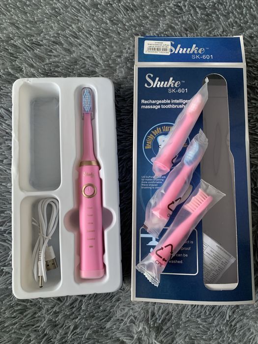 Елетрична зубна щітка на акумуляторі з трьома насадками рожева