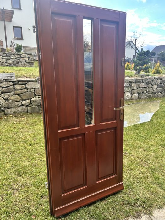 Drzwi zewnętrzne antywłamaniowe lite drewniane zamek Wilka + framuga