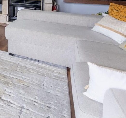 Sofa em bege de tecido